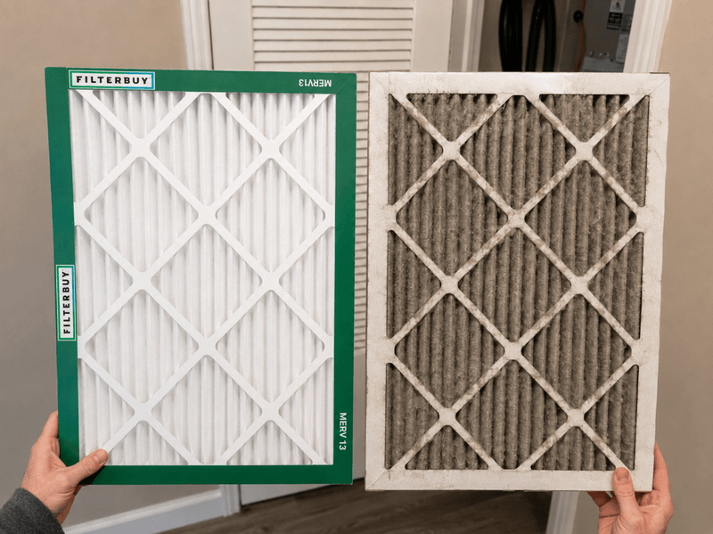 Clean Filterbuy MERV 13 air filter compared with a gray, smoke-loaded used filter from a McKinney, Texas home.